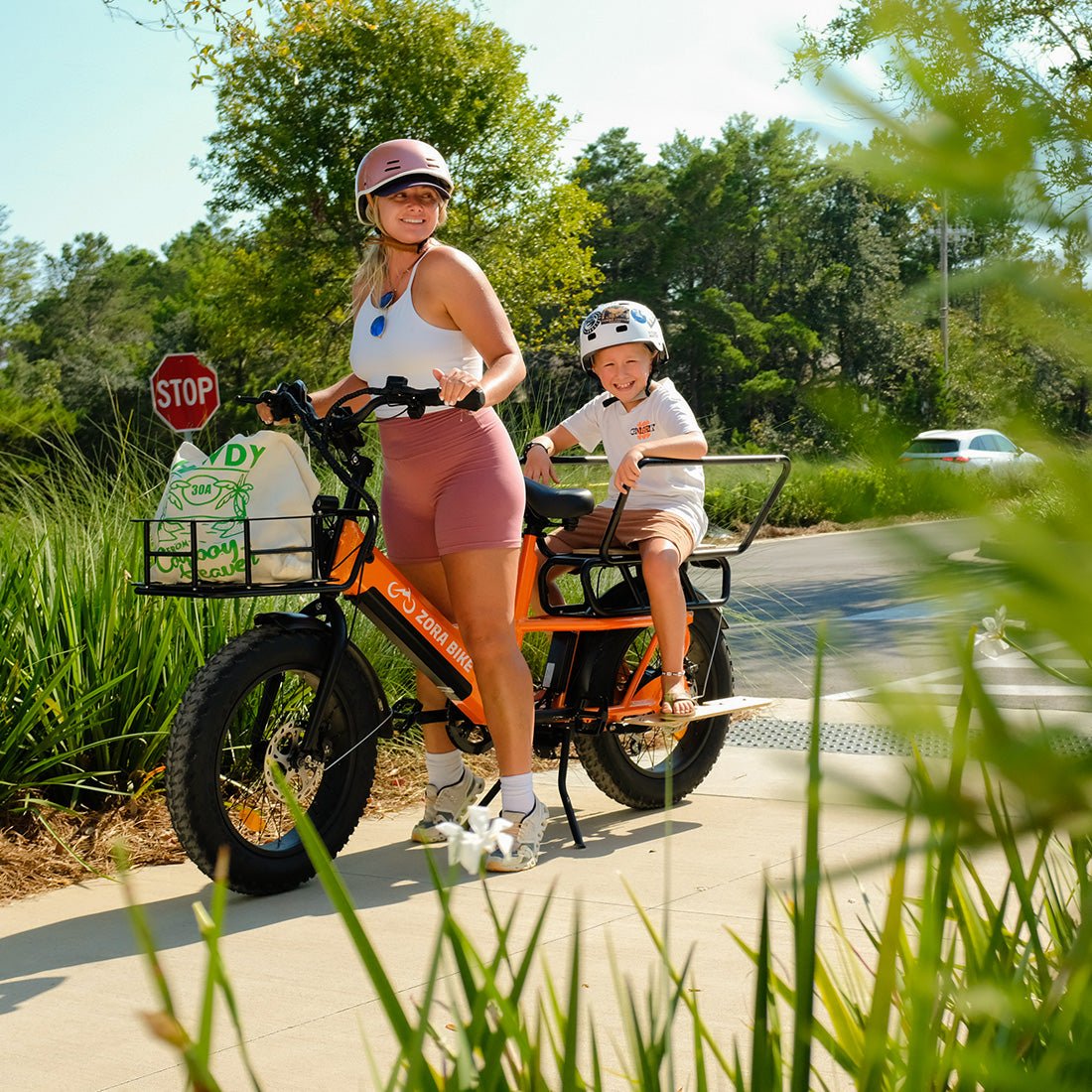 Electric-cargo-bike-zora-master-orange-take-kid-to-school